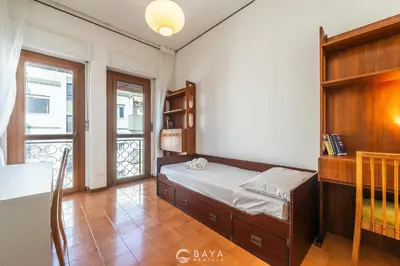 Letto o letti in una camera di Appartamento Generale
