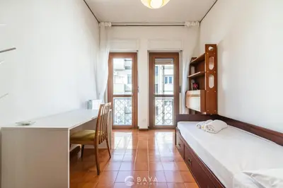 Letto o letti in una camera di Appartamento Generale
