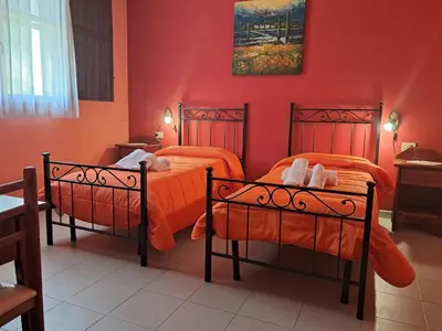 Letto o letti in una camera di Ostello Su Mannau