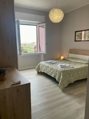 Letto o letti in una camera di Stefy House - Apartment in Cagliari- super Balcony