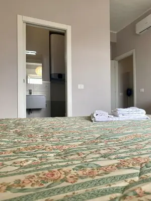 Letto o letti in una camera di Stefy House - Apartment in Cagliari- super Balcony