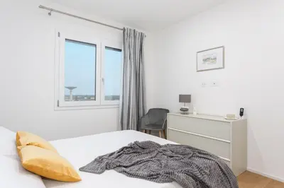 Letto o letti in una camera di Casa Bloom - Penthouse city-center view & Free Parking