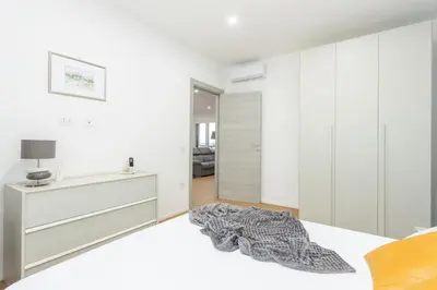 Letto o letti in una camera di Casa Bloom - Penthouse city-center view & Free Parking