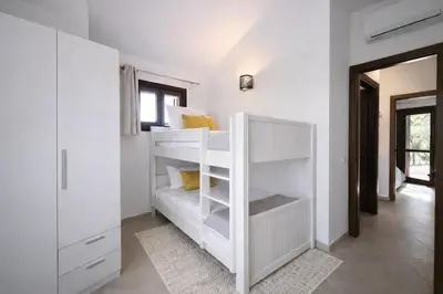 Letto o letti in una camera di Villa Bea - Private Pool, Peaceful Escape in Domus de Maria, Near Chia Beach