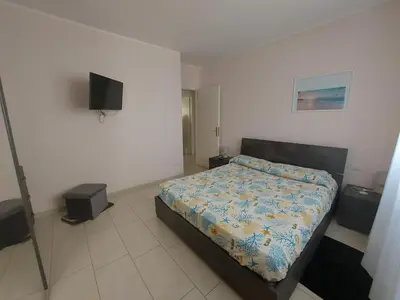 Letto o letti in una camera di Casa di Luca