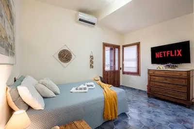 TV o dispositivi per l'intrattenimento presso Corte Luna Solanas Terrazza BBQ 6 ospiti