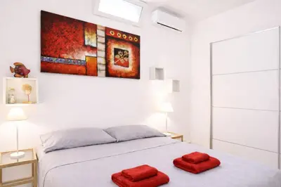 Letto o letti in una camera di EasyFlatSardinia - Coral House Premium - Pinus Village