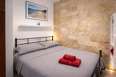 Letto o letti in una camera di EasyFlatSardinia - Coral House Premium - Pinus Village