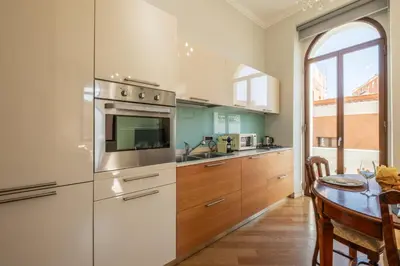 Cucina o angolo cottura di Terrazza Privata- Eleganza mediterranea in Centro Città
