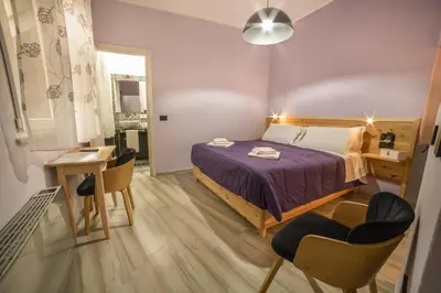 Letto o letti in una camera di Tzia Lillina B&B