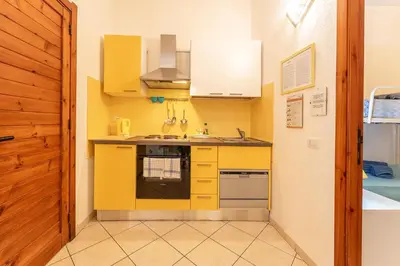 Cucina o angolo cottura di Yellow House, 130m to beach SouthSardiniaHolidays