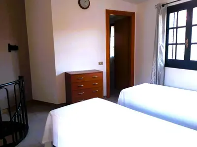 Letto o letti in una camera di Casa Vacanze Rosanna