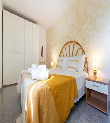 Letto o letti in una camera di Villa i tre pini - Porto Pino