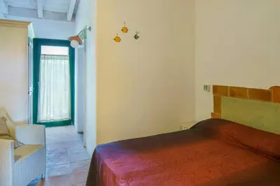 Letto o letti in una camera di Residence Among Scrubland And Beaches In Cova