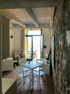Area soggiorno di Residence Among Scrubland And Beaches In Cova