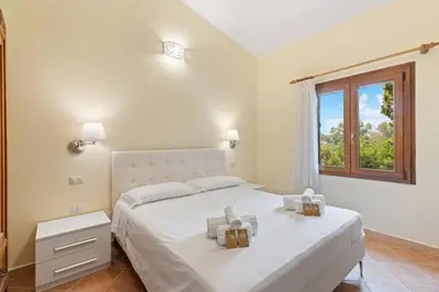 Letto o letti in una camera di Villa Luce