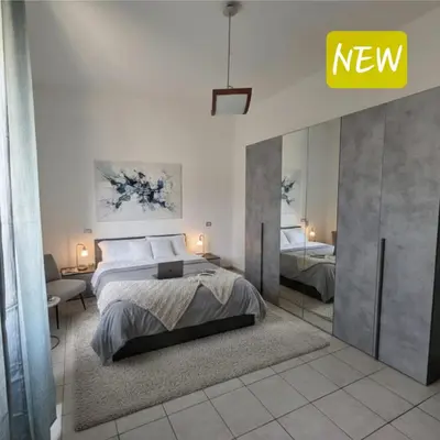 Letto o letti in una camera di Ori-Stay
