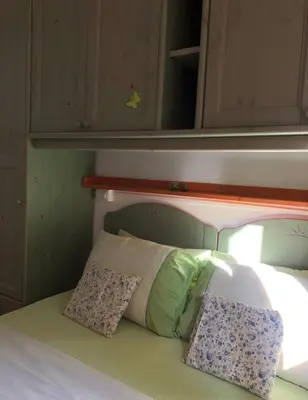 Letto o letti in una camera di Le ninfe