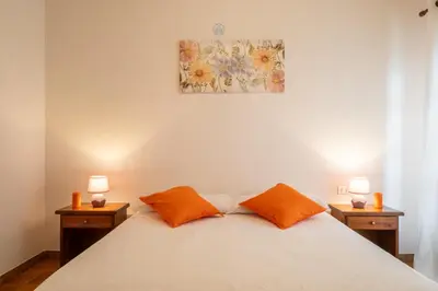 Letto o letti in una camera di Domo de Iannas