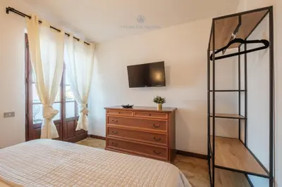 Letto o letti in una camera di Domo de Iannas
