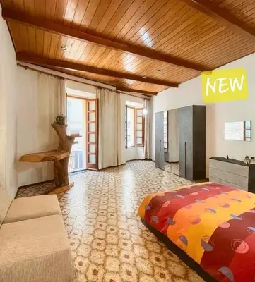 Letto o letti in una camera di Home Bellavista