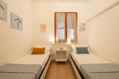 Letto o letti in una camera di Beach Family House 450m to the beach Torre delle Stelle