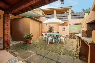 Patio o area all'aperto di Beach Family House 450m to the beach Torre delle Stelle
