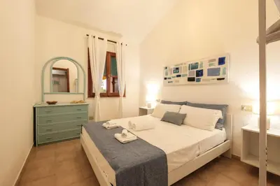 Letto o letti in una camera di Beach Family House 450m to the beach Torre delle Stelle