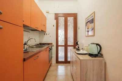 Cucina o angolo cottura di Beach Family House 450m to the beach Torre delle Stelle
