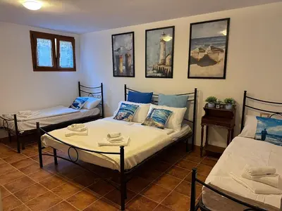 Letto o letti in una camera di Casa Nina
