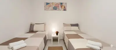 Letto o letti in una camera di WindHeart House With Terrace
