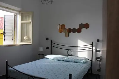 Letto o letti in una camera di Casa Vacanze Zia Mimmia