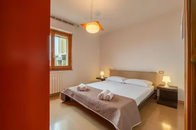 Letto o letti in una camera di Domo Mea
