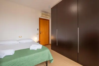 Letto o letti in una camera di Domo Mea