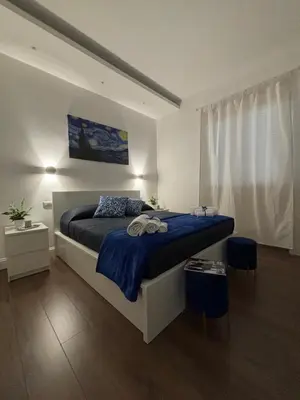 Letto o letti in una camera di Appartamento moderno e Luminoso Cagliari