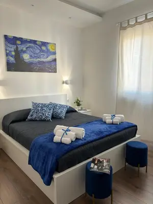 Letto o letti in una camera di Appartamento moderno e Luminoso Cagliari