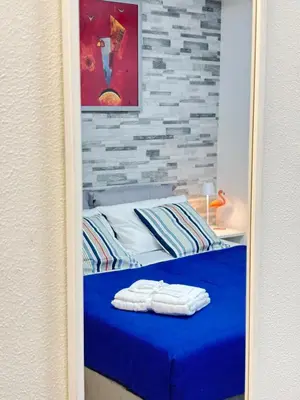 Letto o letti in una camera di Granello di Sabbia