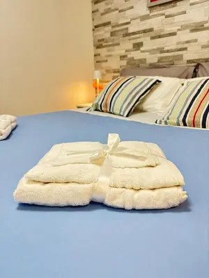 Letto o letti in una camera di Granello di Sabbia