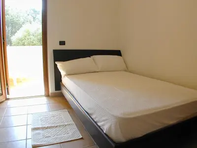 Letto o letti in una camera di Appartamento Markus By La Via Del Mare Viaggi e Vacanze