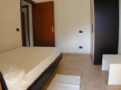 Letto o letti in una camera di Appartamento Markus By La Via Del Mare Viaggi e Vacanze