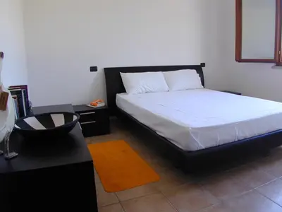Letto o letti in una camera di Appartamento Markus By La Via Del Mare Viaggi e Vacanze