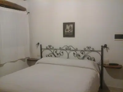 Letto o letti in una camera di Locanda La Rosa