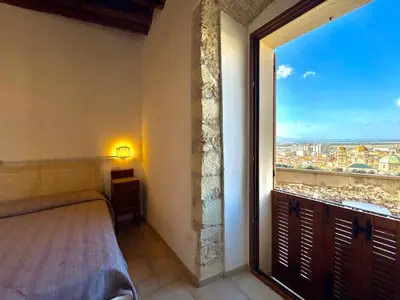 Letto o letti in una camera di Panoramic Place In Castello