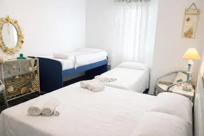 Letto o letti in una camera di Seaside Residence Private Beach AC