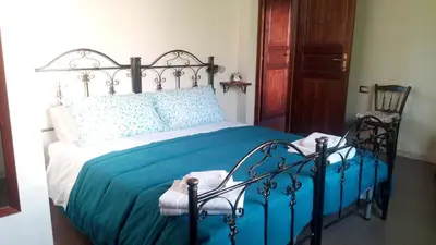 Letto o letti in una camera di Affittacamere Carpe Diem