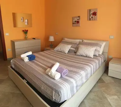 Letto o letti in una camera di Villa with garden Villasimius - Villa con giardino Villasimius