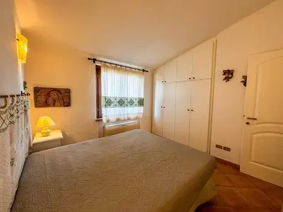 Letto o letti in una camera di Villa Sa Fina