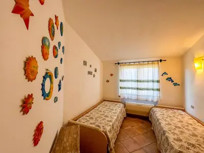 Letto o letti in una camera di Villa Sa Fina