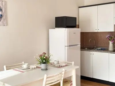 Cucina o angolo cottura di Residenza Nova, a pochi passi dal centro