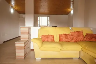 Area soggiorno di Elmas Family Apartment with Large Terrace Close to the Airport